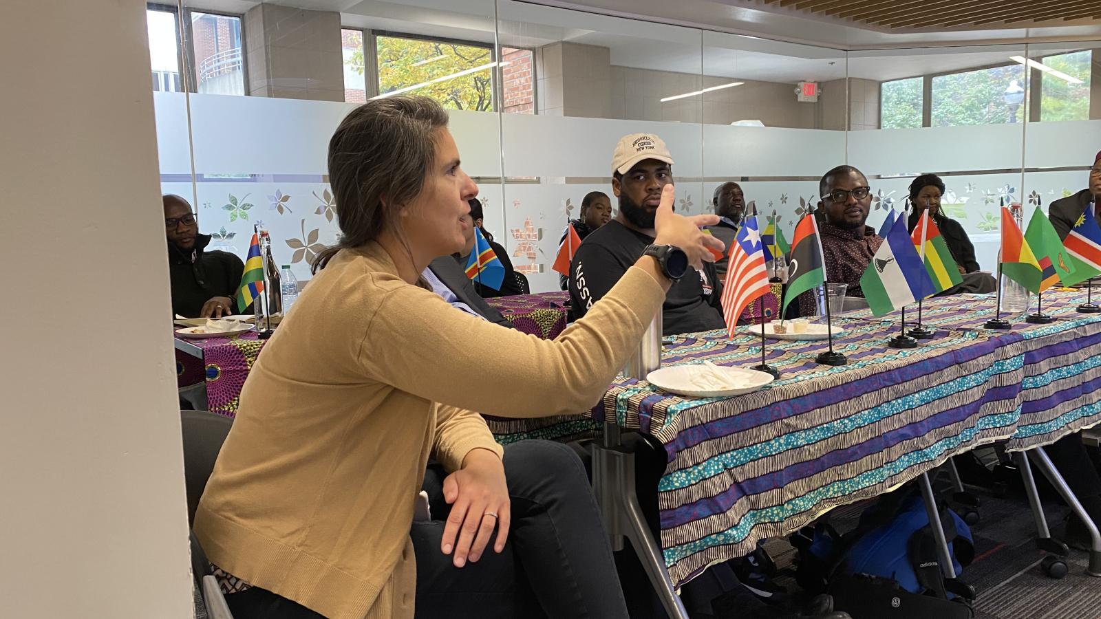 Center for Latin American Study director asking a question at Africa at Noon lecture.