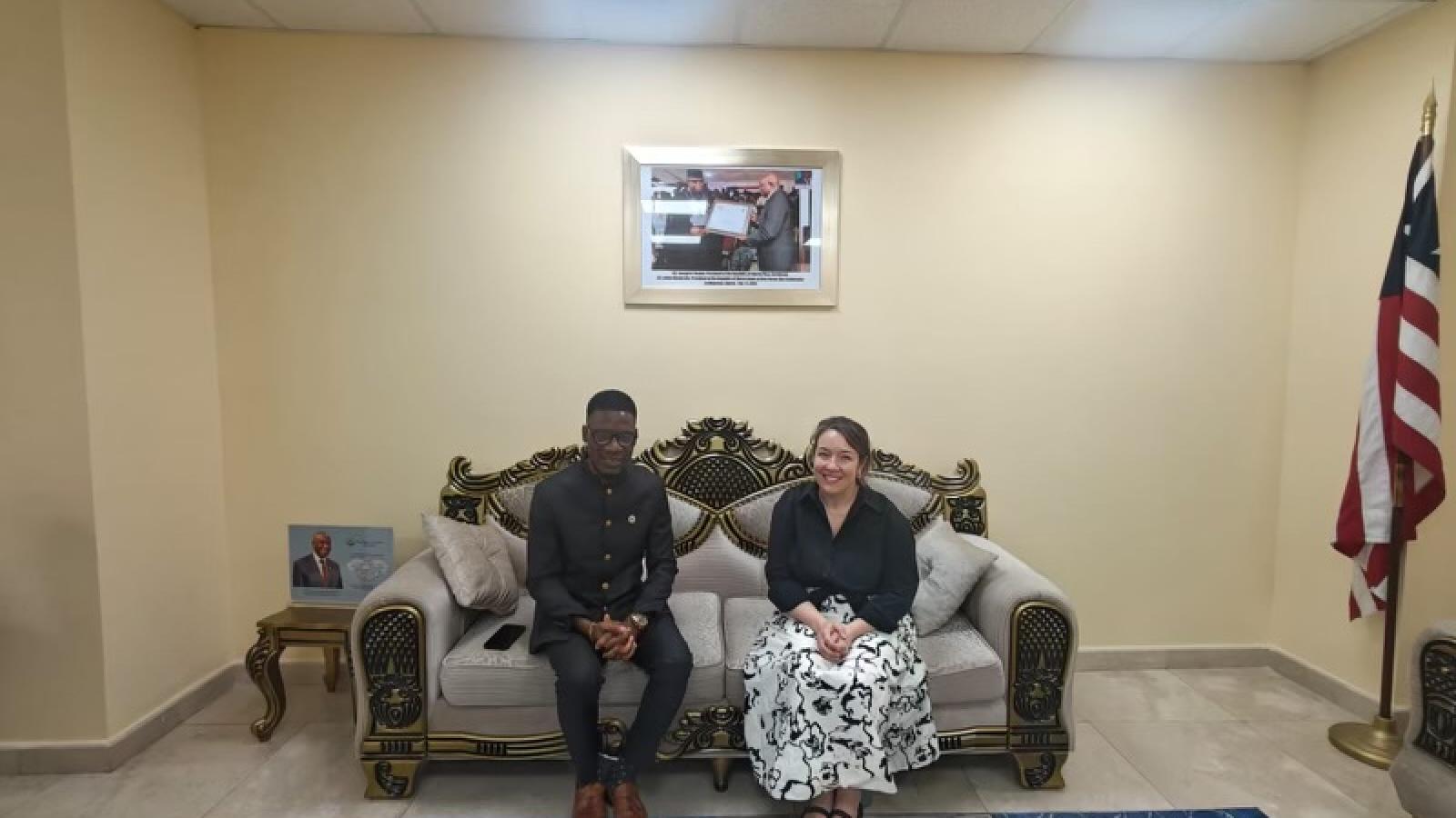 Dr. Quimper with Liberian government official.